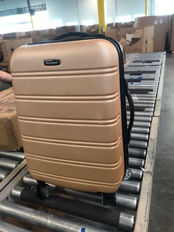 Photo 1 of Rockland Melbourne Hardside Expandable Spinner Wheel Luggage, Champagne, Carry-On 20-Inch