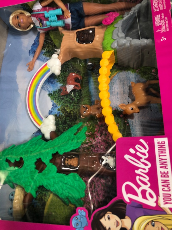 Photo 2 of Barbie Wilderness Guide Doll and Playset, Blonde Fashion Doll with 10 Animal Figures, Tree, Rainbow and More