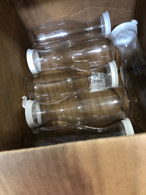 Photo 1 of Clear Plastic Water Pitchers Carafes with Flip top White Lids 50 OZ Heavy Duty Beverage Pitcher Jug for Juice or iced Coffee Great for Mimosa bar Restuarants ot Schools Pack of 6 6 50 OZ