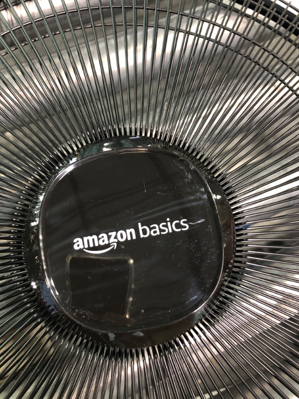 Photo 1 of Amazon Basics Oscillating Dual Blade Standing Pedestal Fan with Remote - 16-Inch, Black