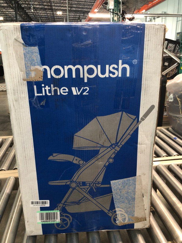 Photo 1 of Mompush Lithe V2 Lightweight Stroller + Snack Tray, Ultra-Compact Fold & Airplane Ready Travel Stroller, Near Flat Recline Seat, Cup Holder, Raincover & Travelbag Included Forest