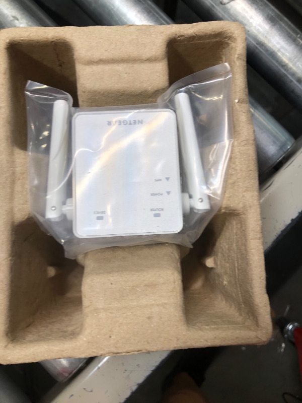 Photo 1 of NETGEAR Wi-Fi Range Extender EX3700 - Coverage Up to 1000 Sq Ft and 15 Devices with AC750 Dual Band Wireless Signal Booster & Repeater (Up to 750Mbps Speed), and Compact Wall Plug Design WiFi Extender AC750
