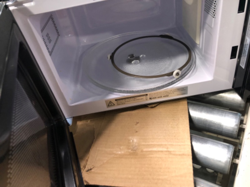 Photo 1 of COMFEE' EM720CPL-PMB Countertop Microwave Oven with Sound On/Off, ECO Mode and Easy One-Touch Buttons, 0.7cu.ft, 700W, Black Black Microwave