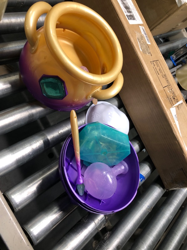 Photo 1 of Magic Mixies Magical Misting Cauldron with Interactive 8 inch Blue Plush Toy and 50+ Sounds and Reactions, Multicolor