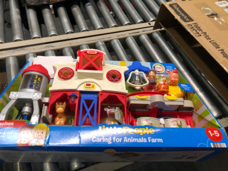 Photo 1 of Fisher-Price Little People Farm Toy, Toddler Playset with Lights Sounds and Smart Stages Learning Content, Caring for Animals Farm? Standard