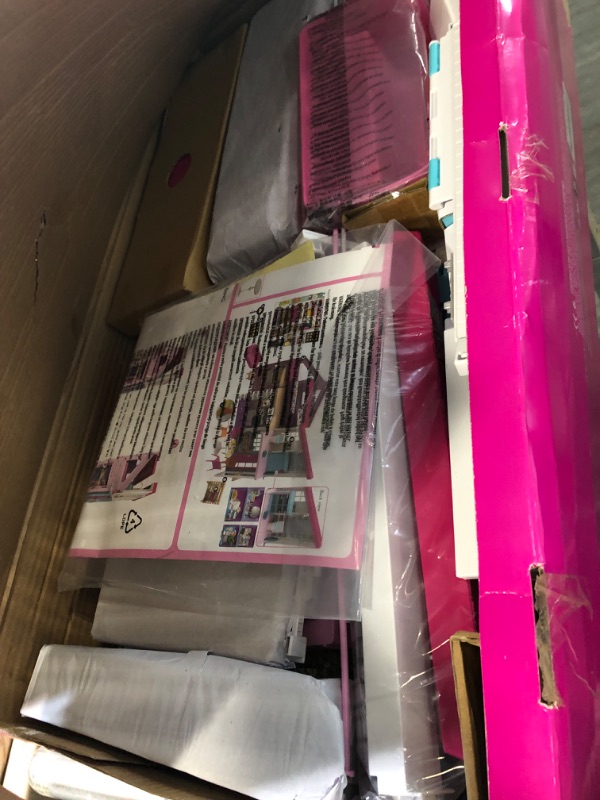Photo 1 of Barbie Malibu House 2-Story, 6-Room Dollhouse with Transformation Features, Plus 25+ Pieces Including Furniture, Patio Fence and Accessories, for Kids 3 Years Old and Up