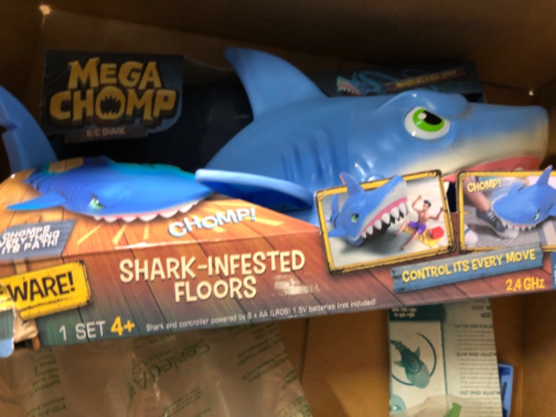 Photo 3 of Skyrocket Mega Chomp Remote Control Shark Toys for Boys and Girls Ages 4+ with 2.4 GHz Controller and RC Chomping Action, Blue (18493)