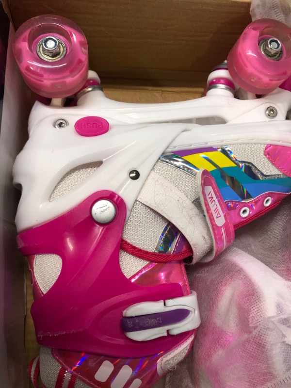 Photo 1 of Roller Skates for Girls and Boys,4 Size Adjustable Kids Toddler Roller Skates with Light up Wheels for Toddlers Children Outdoor Indoor Pink Large(3-6Y)