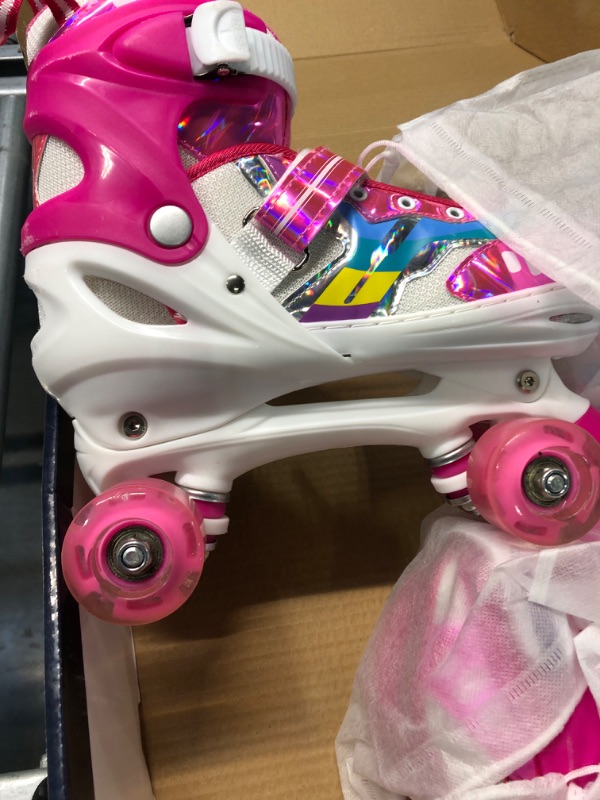 Photo 1 of Roller Skates for Girls and Boys,4 Size Adjustable Kids Toddler Roller Skates with Light up Wheels for Toddlers Children Outdoor Indoor Pink Large(3-6Y)