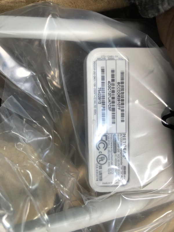 Photo 1 of NETGEAR Wi-Fi Range Extender EX6120 - Coverage Up to 1500 Sq Ft and 25 Devices with AC1200 Dual Band Wireless Signal Booster & Repeater (Up to 1200Mbps Speed), and Compact Wall Plug Design WiFi Extender AC1200