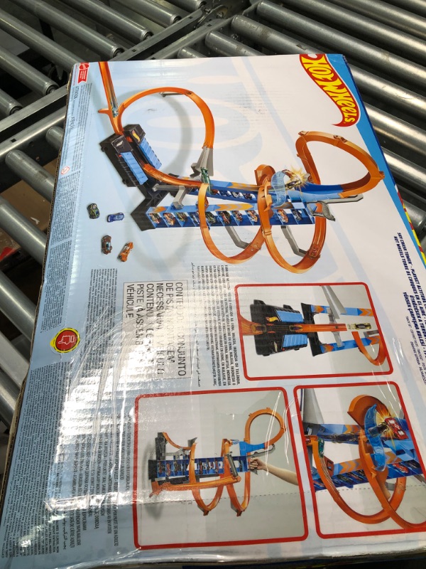 Photo 2 of Hot Wheels Sky Crash Tower Track Set, 2.5+ ft High with Motorized Booster, Orange Track & 1 Vehicle, Race Multiple Cars, Gift for Kids 5 to 10 Years Old & Up