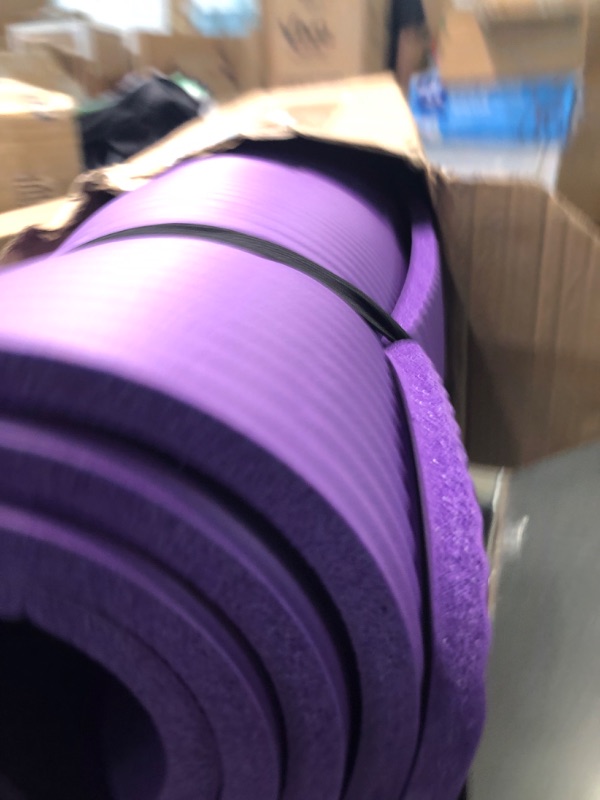 Photo 1 of Amazon Basics Extra Thick Exercise Yoga Gym Floor Mat with Carrying Strap - 74 x 24 x .5 Inches, Purple & High-Density Round Foam Roller for Exercise and Recovery - 36 Inch, Black