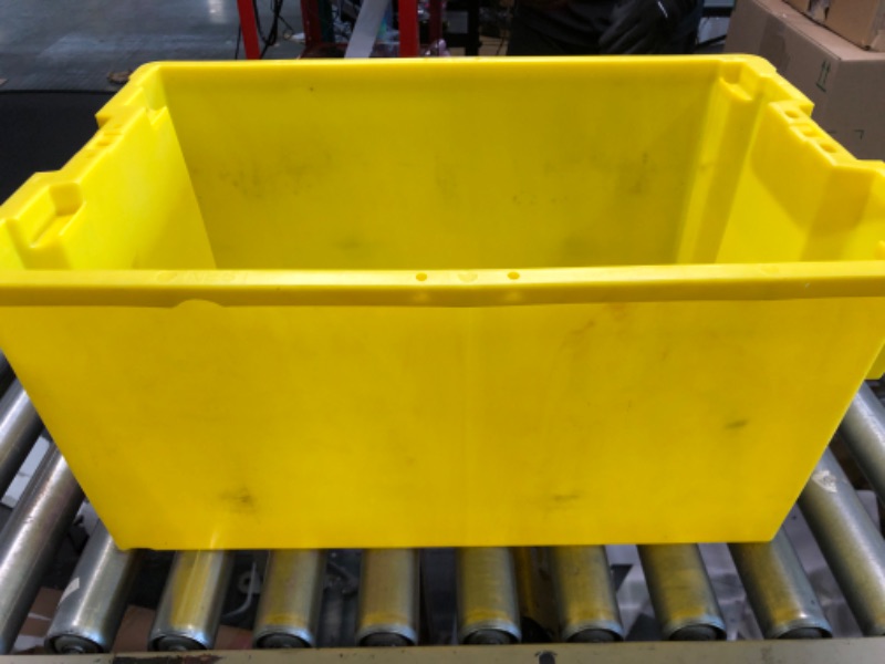 Photo 2 of  Yellow medium Plastic Storage Bin please notice the dirt spots, see pictures