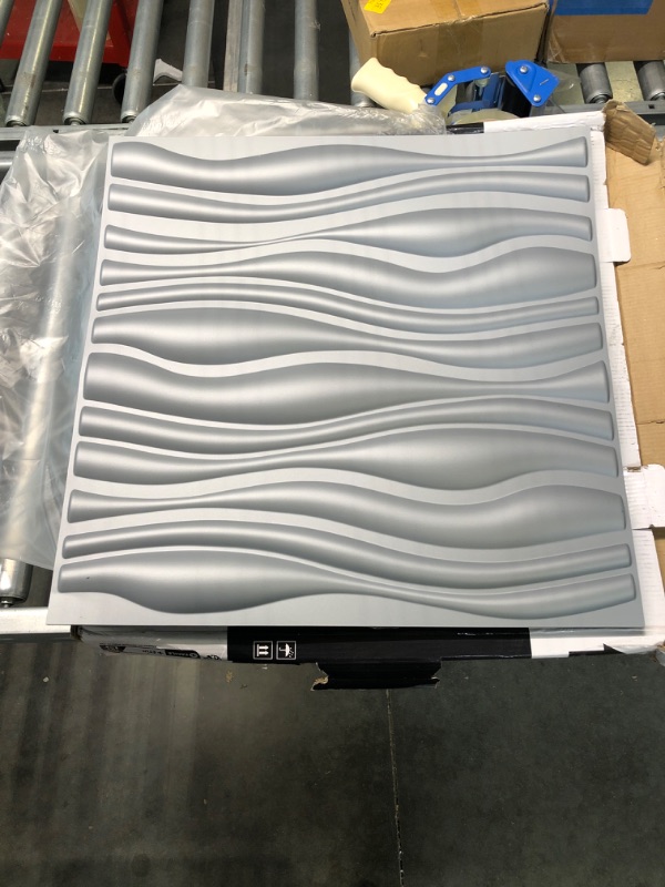 Photo 2 of Art3d PVC Wave Board Textured 3D Wall Panels, Grey, 19.7" x 19.7" (12 Pack) Silver