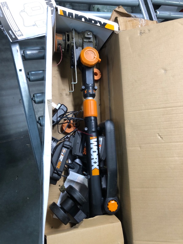 Photo 2 of Worx WG170 GT Revolution 20V 12 Inch Grass Trimmer/Edger/Mini-Mower (Batteries & Charger Included) & WA3578 - PowerShare 20V 4.0Ah, Lithium Ion High Capacity Battery, Orange and Black 2 X 20V 2.0Ah Batteries Included Revolution + Capacity Battery