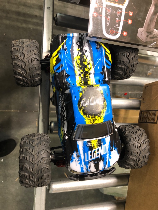 Photo 2 of LAEGENDARY Fast RC Cars for Adults and Kids - 4x4, Off-Road Remote Control Car - Battery-Powered, Hobby Grade, Waterproof Monster RC Truck - Toys and Gifts for Boys, Girls and Teens Blue - Yellow Blue Yellow Up to 31 mph