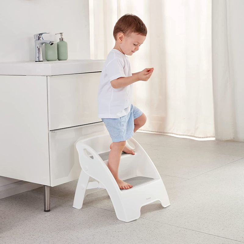 Photo 1 of Step Stool for Kids, Toddler Step Stool for Bathroom Sink and Potty Training, Foldable and Integral Kitchen Helper 2-Step Stool with Handles and Slip-Resistant Soft Grips (Grey)