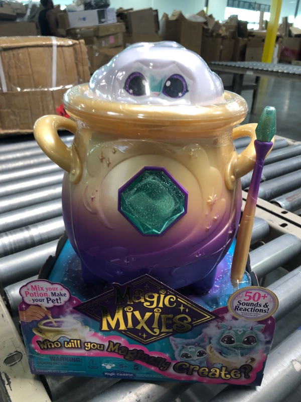 Photo 2 of Magic Mixies Magical Misting Cauldron with Interactive 8 inch Blue Plush Toy and 50+ Sounds and Reactions, Multicolor