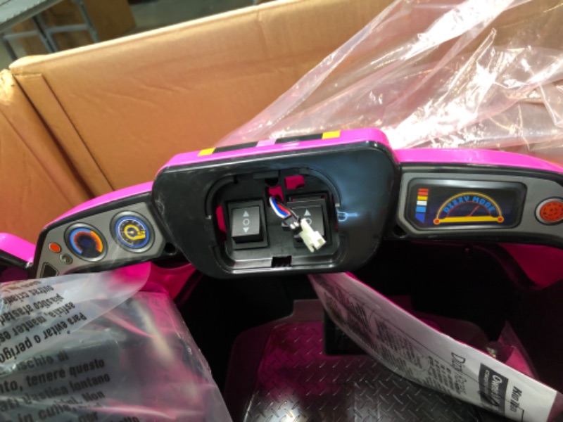 Photo 1 of Kid Trax Dizzy Racers Child Ride On Car, 2-5 Years Old, Max Rider Weight 66lbs, 6 Volt Rechargeable, 360 Spin, Battery Powered car, Child Electric Toy, Pink