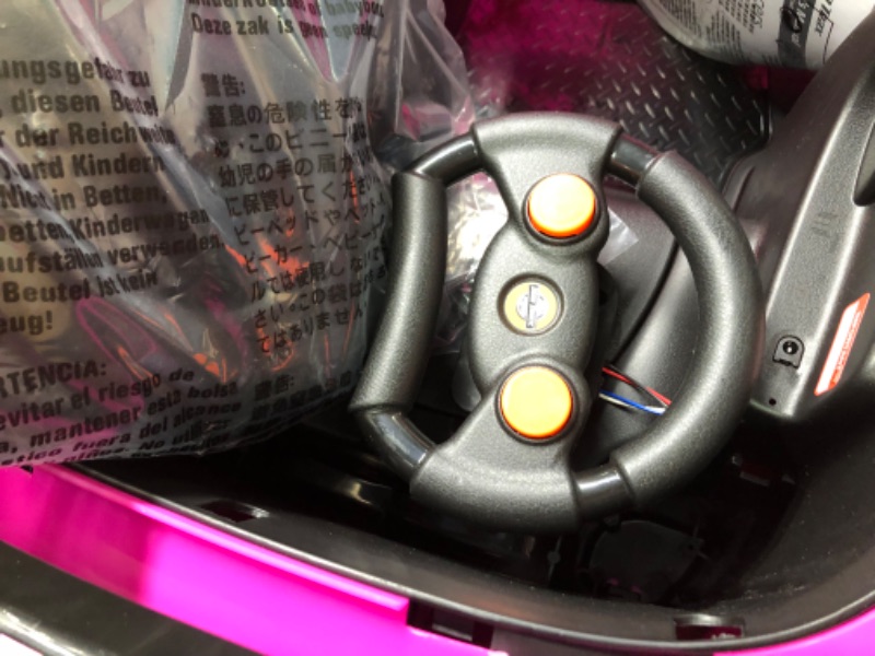 Photo 1 of Kid Trax Dizzy Racers Child Ride On Car, 2-5 Years Old, Max Rider Weight 66lbs, 6 Volt Rechargeable, 360 Spin, Battery Powered car, Child Electric Toy, Pink