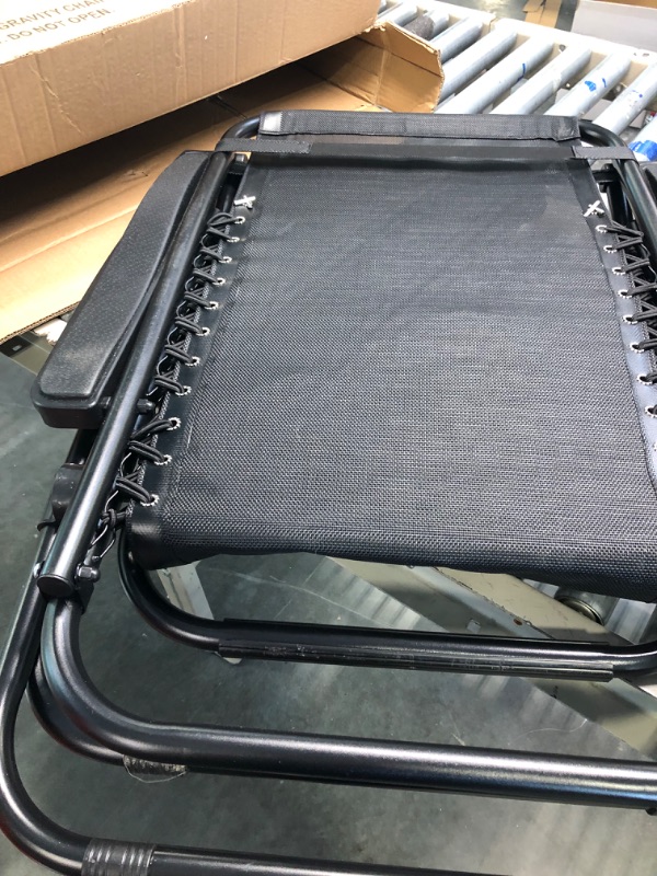 Photo 5 of Amazon Basics Outdoor Textilene Adjustable Zero Gravity Folding Reclining Lounge Chair with Pillow, Black Black Chair