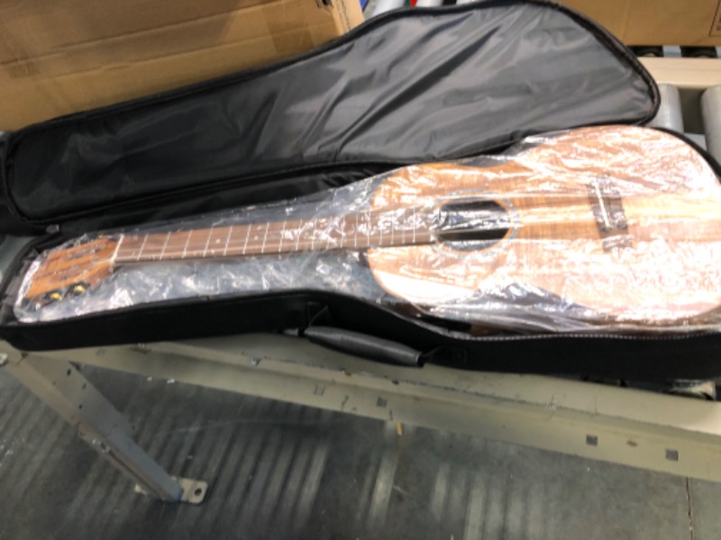 Photo 3 of Caramel CB207 Acacia Baritone Acoustic Electric Ukulele with Truss Rod with Additional Strings, Padded Gig Bag, Strap and EQ cable Laminated