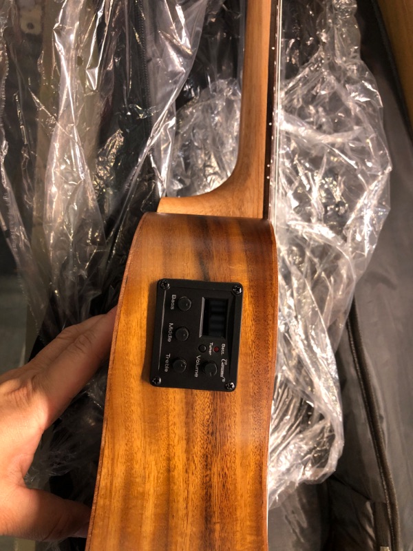 Photo 8 of Caramel CB207 Acacia Baritone Acoustic Electric Ukulele with Truss Rod with Additional Strings, Padded Gig Bag, Strap and EQ cable Laminated