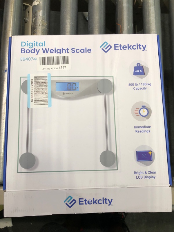 Photo 1 of Etekcity Digital Body Weight Bathroom Scale, Large Blue LCD Backlight Display, High Precision Measurements,6mm Tempered Glass, 400 Pounds Non Smart Silver
