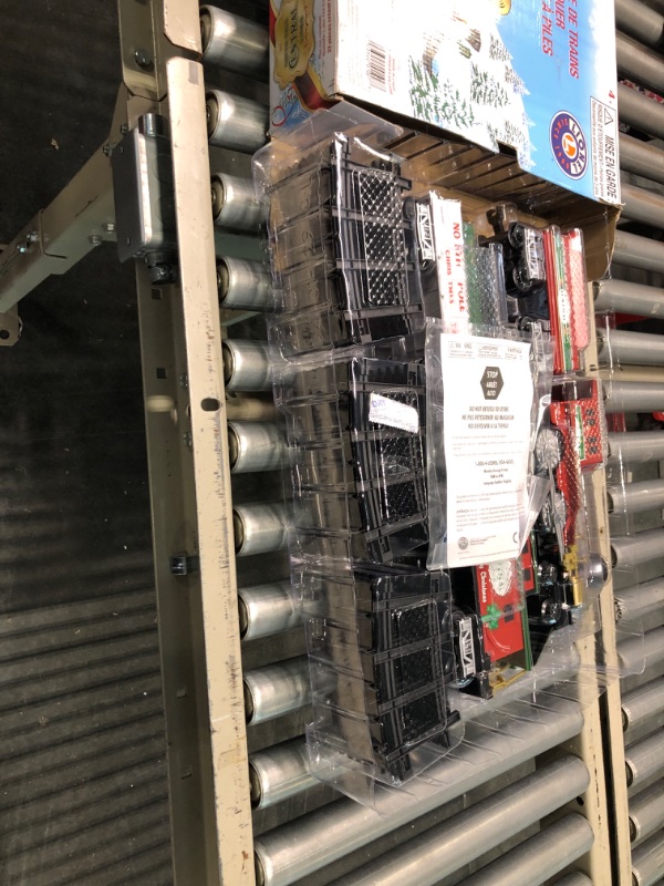 Photo 1 of Lionel North Pole Central Battery-Powered Train Set with Remote + Inner Loop Track Expansion Pack Complete Set + Expansion Track (Inner Loop)