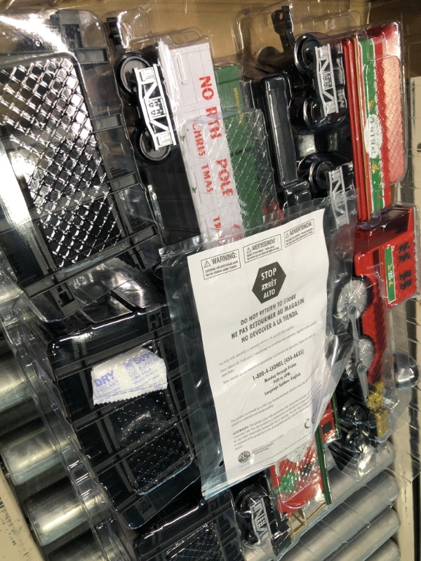 Photo 1 of Lionel North Pole Central Battery-Powered Train Set with Remote + Inner Loop Track Expansion Pack Complete Set + Expansion Track (Inner Loop)