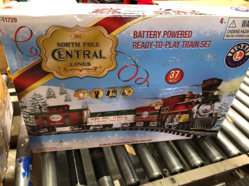 Photo 2 of Lionel North Pole Central Battery-Powered Train Set with Remote + Inner Loop Track Expansion Pack Complete Set + Expansion Track (Inner Loop)