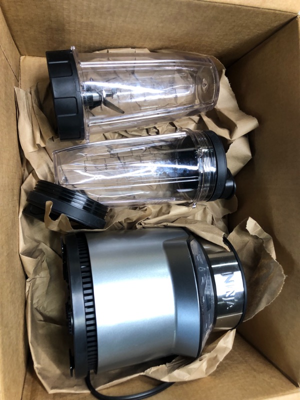 Photo 1 of Ninja BN401 Nutri Pro Compact Personal Blender, Auto-iQ Technology, 1100-Peak-Watts, for Frozen Drinks, Smoothies, Sauces & More, with (2) 24-oz. To-Go...