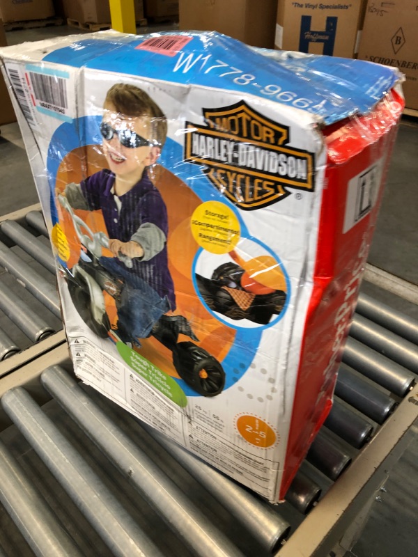 Photo 2 of Fisher-Price Harley-Davidson Tricycle with Handlebar Grips and Storage Area, Multi-Terrain Tires, Tough Trike [Amazon Exclusive]