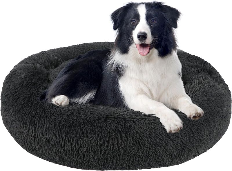 Photo 1 of Calming Dog Bed for Small Dogs, Anti Anxiety Fluffy Faux Fur Plush Dog Bed Cat Bed, 30 Inch Warming Cozy Soft Dog Donut Round Bed, Anti Slip Waterproof Mute Base Dog Cuddler Bed, Dark Grey