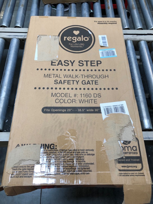 Photo 1 of Regalo Easy Step Walk Thru Gate and Easy Open 50 Inch Super Wide Walk Thru Gate