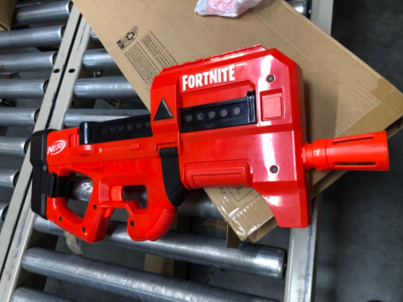 Photo 4 of NERF Fortnite Compact SMG Motorized Blaster, Ultra Red Wrap Design, 8-Dart Internal Clip, 8 Elite Foam Darts, Electric Semi Auto Fortnite Toy Blaster