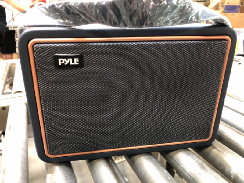 Photo 6 of Pyle Vintage Bluetooth Speaker - Rechargeable Leather Portable Wireless Retro Style Audio System with TWS, 260W Heavy Bass Music Player, 5H Long Playtime, AUX, Mic in, Remote Control, Carrying Strap