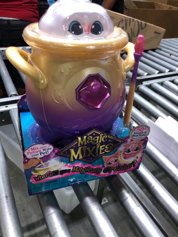 Photo 2 of Magic Mixies Magical Misting Cauldron with Interactive 8 inch Blue Plush Toy and 50+ Sounds and Reactions, Multicolor