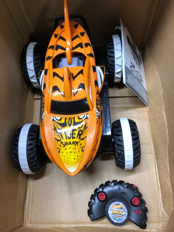 Photo 2 of Hot Wheels Monster Trucks, Remote Control Car, Monster Truck Toy with All-Terrain Wheels, 1:15 Scale Unstoppable Tiger Shark RC