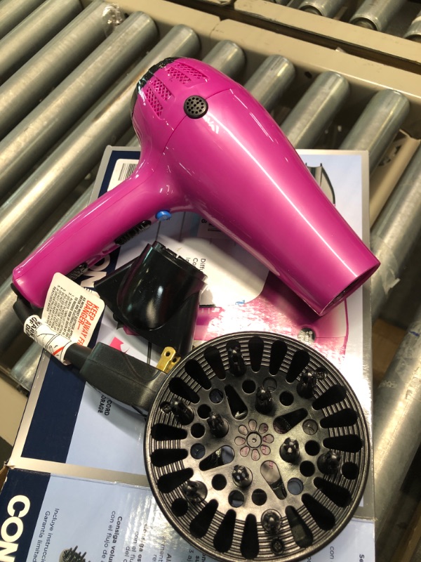 Photo 2 of Conair Hair Dryer with Retractable Cord, 1875W Cord-Keeper Blow Dryer Pink