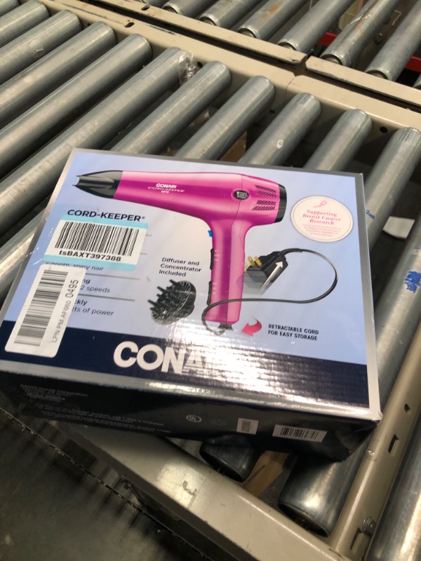 Photo 3 of Conair Hair Dryer with Retractable Cord, 1875W Cord-Keeper Blow Dryer Pink