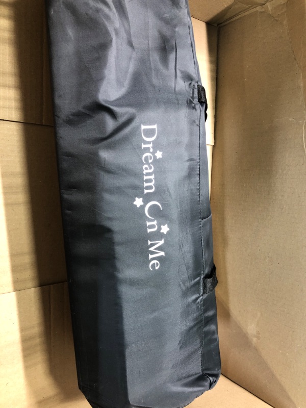Photo 1 of Dream On Me Zodiak Portable Playard in Black, Lightweight, Packable and Easy Setup Baby Playard, Breathable Mesh Sides and Soft Fabric - Comes with a Removable Padded Mat
