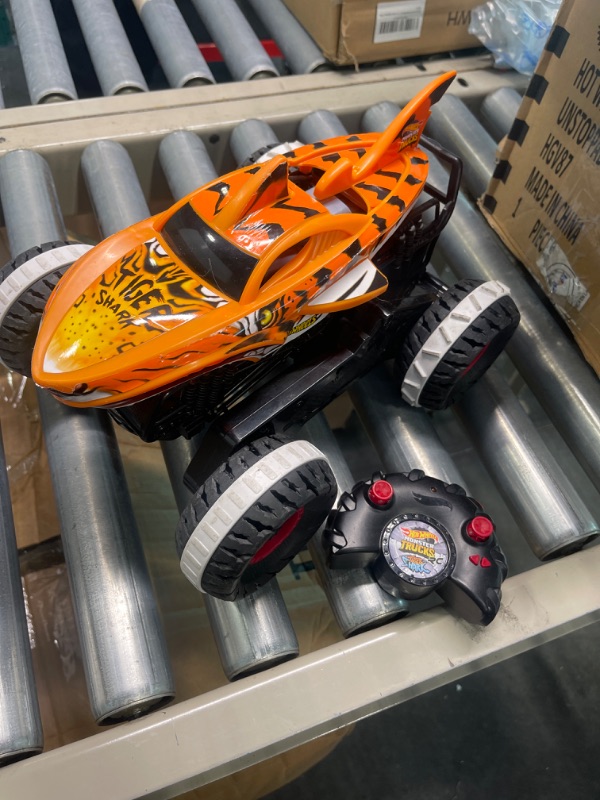 Photo 2 of Hot Wheels Monster Trucks, Remote Control Car, Monster Truck Toy with All-Terrain Wheels, 1:15 Scale Unstoppable Tiger Shark RC