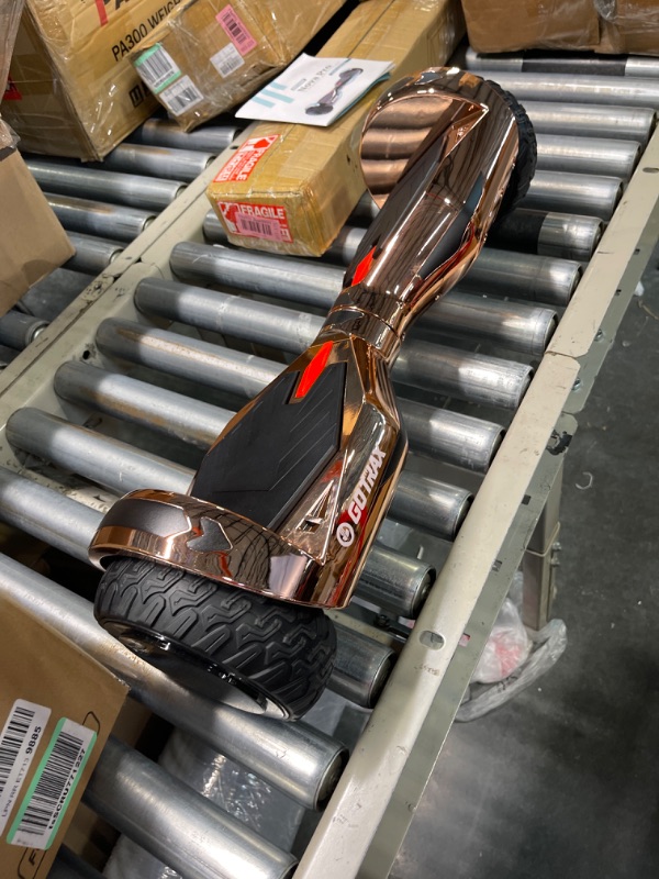 Photo 1 of Gotrax NOVA PRO Hoverboard with LED 6.5" Offroad Tires, Music Speaker and 6.2mph & 5 Miles, UL2272 Certified, Dual 200W Motor and 93.6Wh Battery All Terrain Self Balancing Scooters for Kids Adults NOVA PRO-Rosegold
