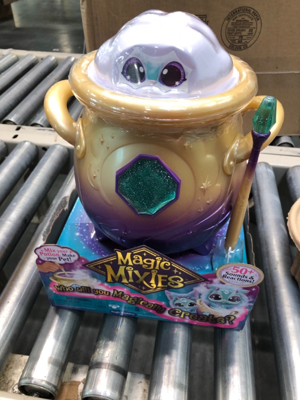 Photo 1 of Magic Mixies Magical Misting Cauldron with Interactive 8 inch Blue Plush Toy and 50+ Sounds and Reactions, Multicolor