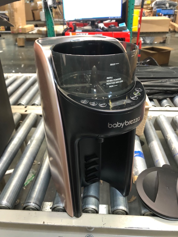 Photo 1 of New and Improved Baby Brezza Formula Pro Advanced Formula Dispenser Machine - Automatically Mix a Warm Formula Bottle Instantly - Easily Make Bottle with Automatic Powder Blending, Rose Gold886267008719

