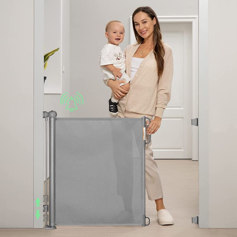 Photo 1 of Momcozy Retractable Baby Gate, 33" Tall, Extends up to 55" Wide, Child Safety Baby Gates for Stairs, Doorways, Hallways, Indoor, Outdoor
