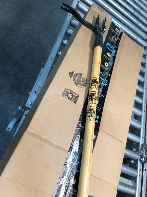 Photo 1 of Grampa's Weeder - The Original Stand Up Weed Puller Tool with Long Handle - Made with Real Bamboo & 4-Claw Steel Head Design - Easily Remove Weeds Without Bending, Pulling, or Kneeling