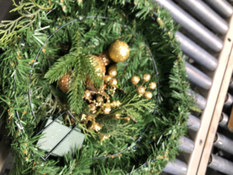 Photo 1 of AMERZEST Pre-lit Flocked Christmas Wreath with Red Balls,Berries and Bows,24 Inch 50 Battery Operated LED Lights,Holiday Decoration for Front Door Outdoor Snow
