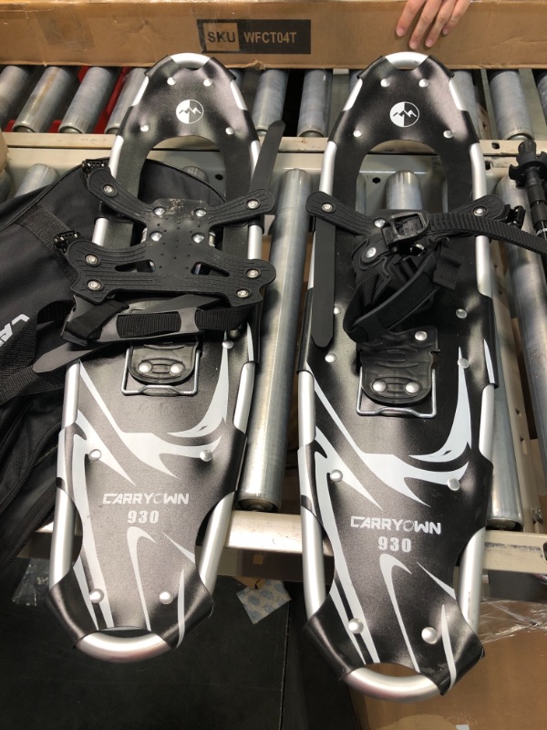 Photo 1 of Carryown 3 in 1 Light Weight Snowshoes Set for Adults Men Women Youth Kids, Aluminum Alloy Terrain Snow Shoes with Trekking Poles and Carrying Tote Bag, 14" /21"/ 25"/ 30" Black(snowshoes+pole) 21"(70-150 lbs)